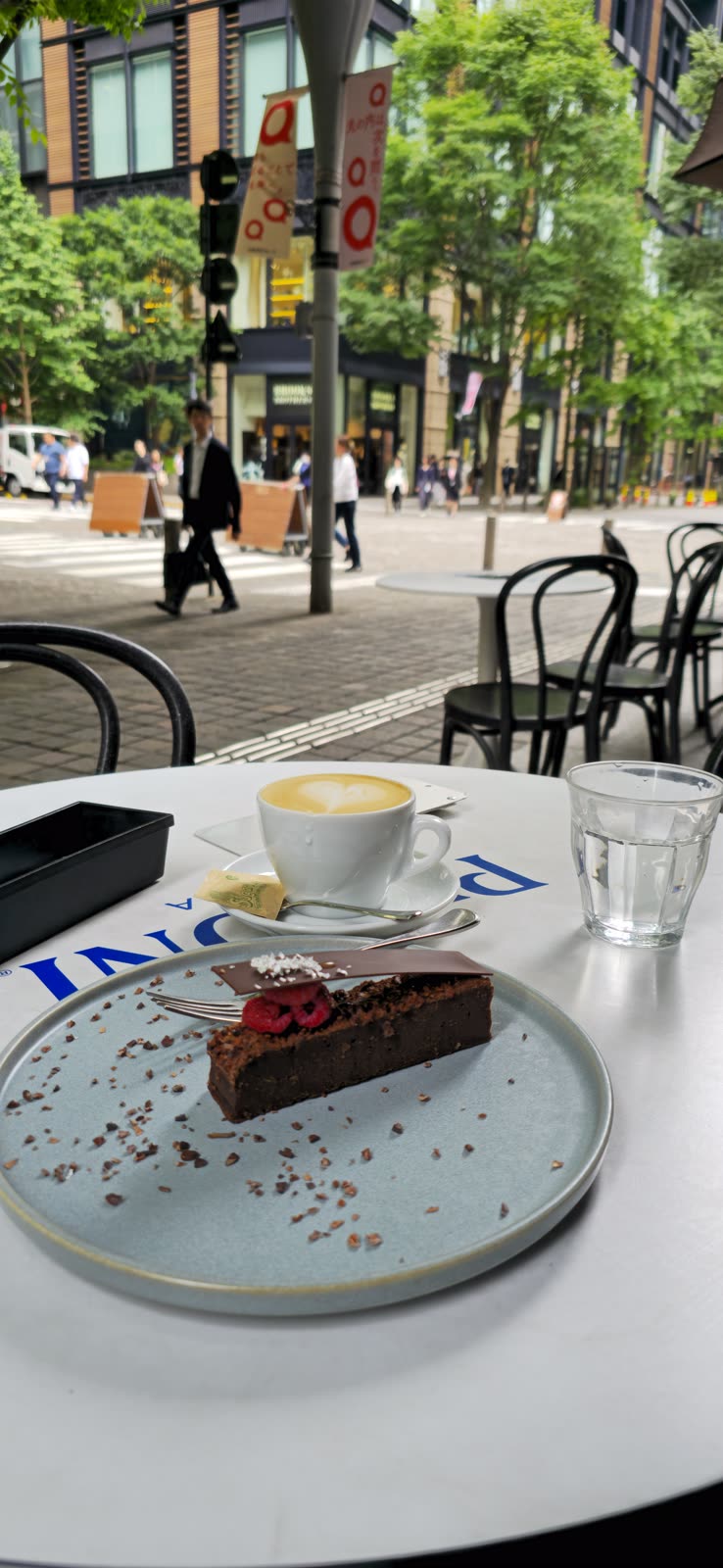 Coffee and cake at an outdoor cafe